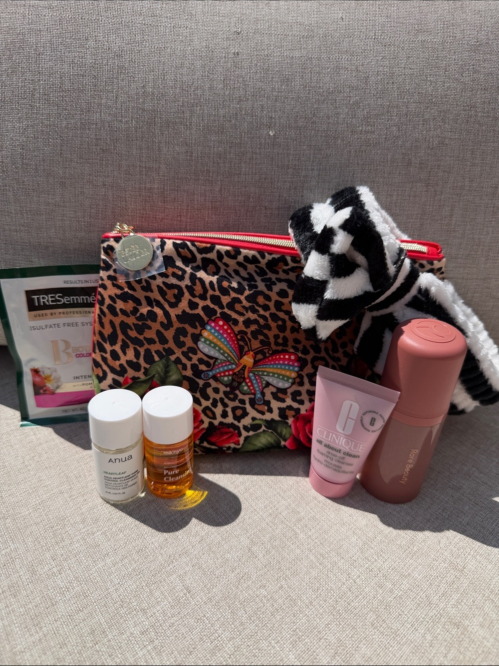 Clinique, Rare Beauty Bundle with Estée Lauder cosmetic pouch